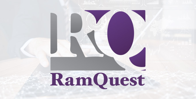 Large transparent R on gray and Q on purple with purple RamQuest written below with a man wearing a suit sitting at a table with a document in the background
