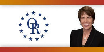 ORT logo with image of smiling woman with short brown hair.