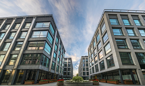 an in between view of four Similar buildings 