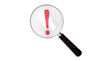 A magnifying glass over a red exclamation mark.