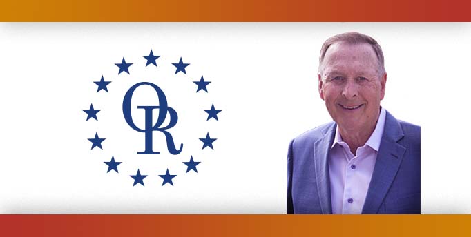 ORT logo with image of smiling man with gray hair wearing blue blazer.