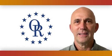 ORT logo with image of smiling bald man.